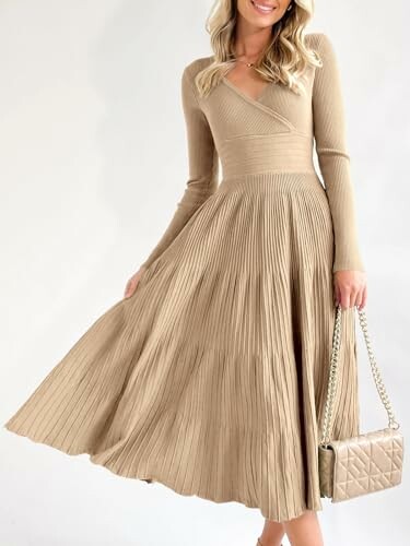 Woman wearing a beige knit dress with a quilted handbag.
