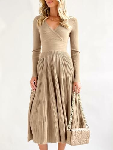 Woman in beige knit dress holding a quilted handbag.