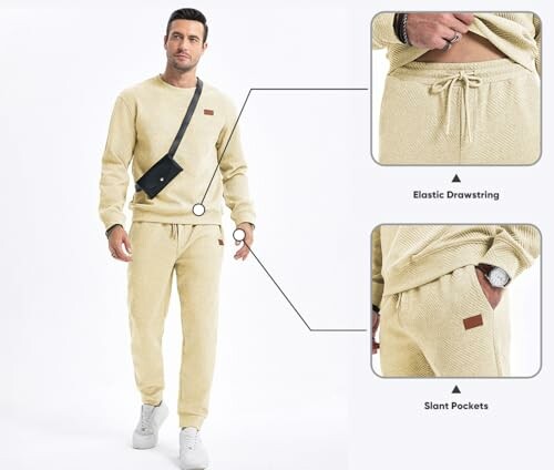Man wearing beige sweatsuit with elastic drawstring and slant pockets.