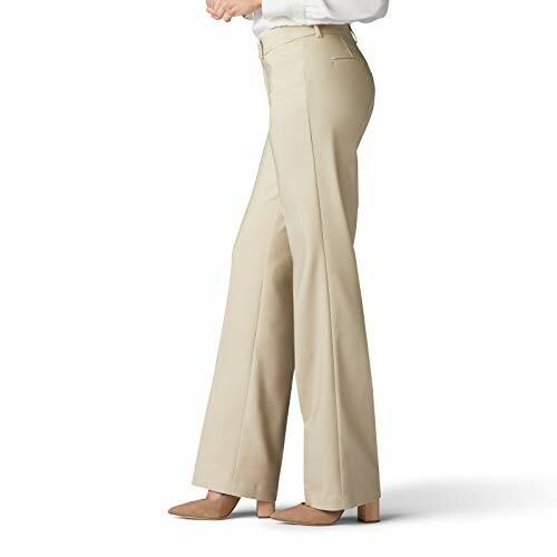 Side view of beige wide-leg pants worn with a white top and brown shoes.