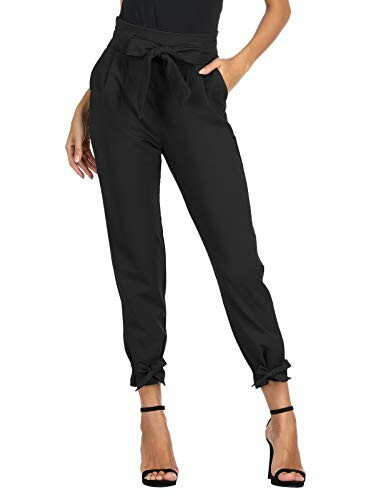 Woman wearing black paperbag waist pants with high heels
