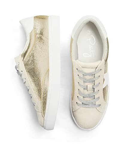 Gold and white sneakers viewed from above