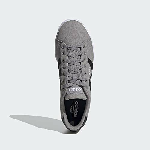 Top view of a gray sneaker with laces.