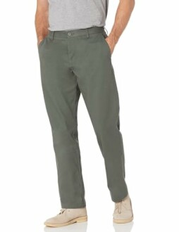 Person wearing green chino pants and beige shoes