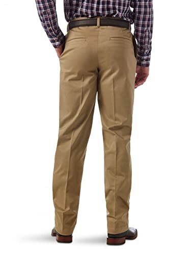 Back view of a man wearing khaki pants and a plaid shirt.
