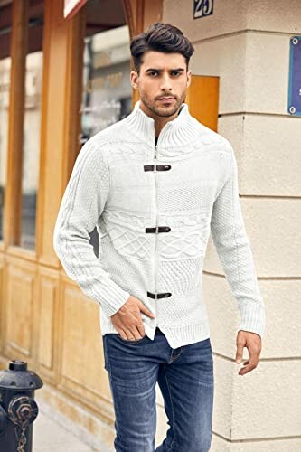 Man in white sweater walking on street