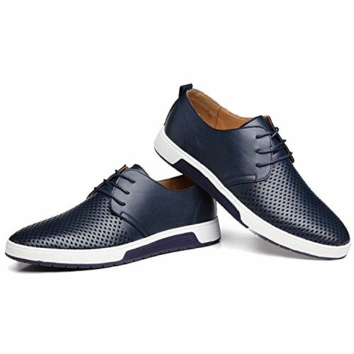 Navy blue perforated casual shoes with white soles.