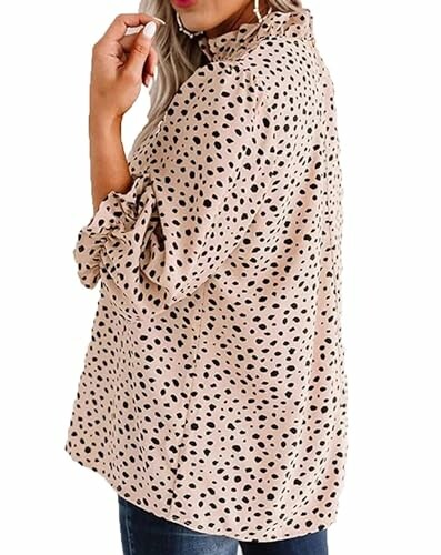 Woman wearing a beige polka dot blouse