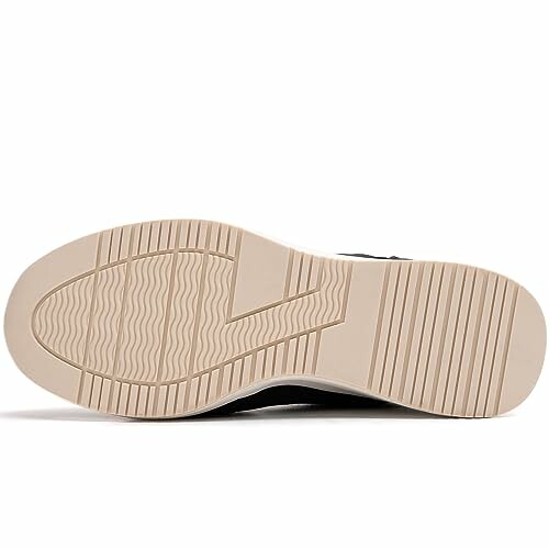 Bottom view of a sneaker showing the sole pattern