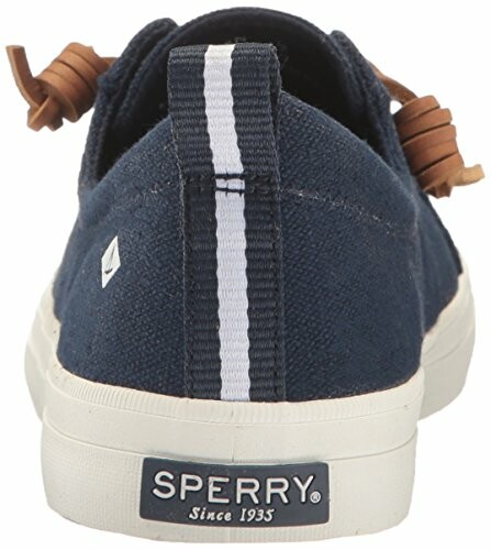Back view of a Sperry canvas sneaker with leather laces.