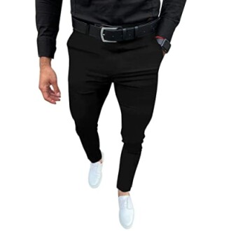 Man wearing black pants and white sneakers.