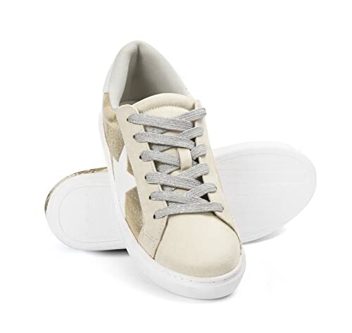 White and gold sneakers with a star design