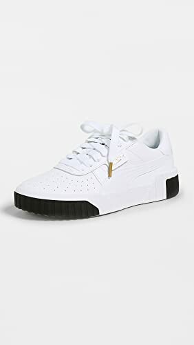 White sneaker with black sole and laces