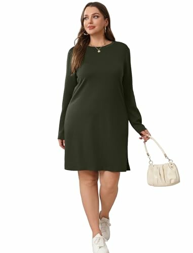 Woman in green dress with white handbag
