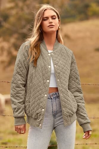Woman in a quilted jacket standing outdoors