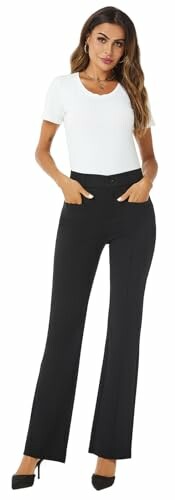 Woman in white top and black pants